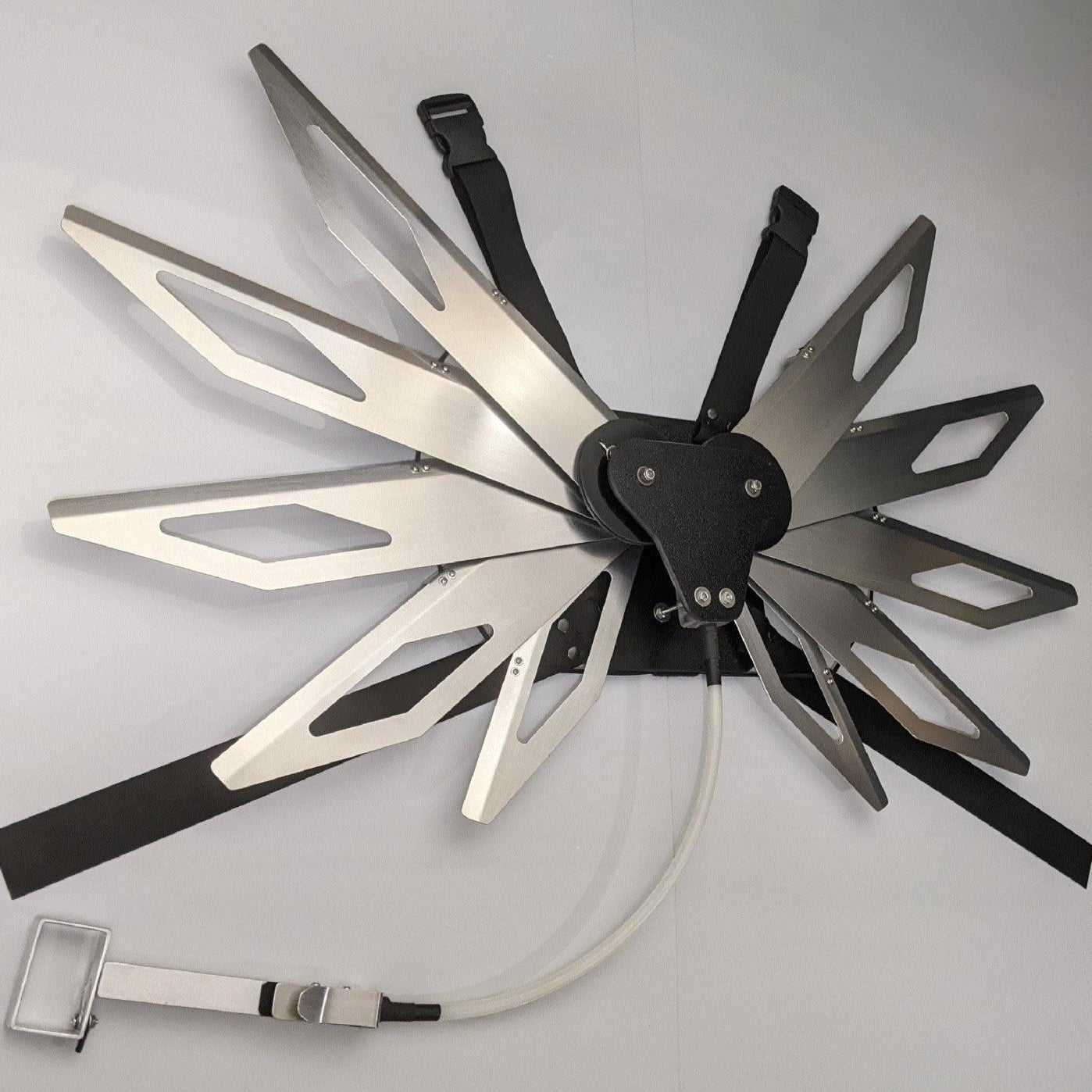 Costume black and silver metal mechanical wings that open and close with a pull cord